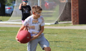 RRMS Students and Staff Cap Kick-it with Kickball Games