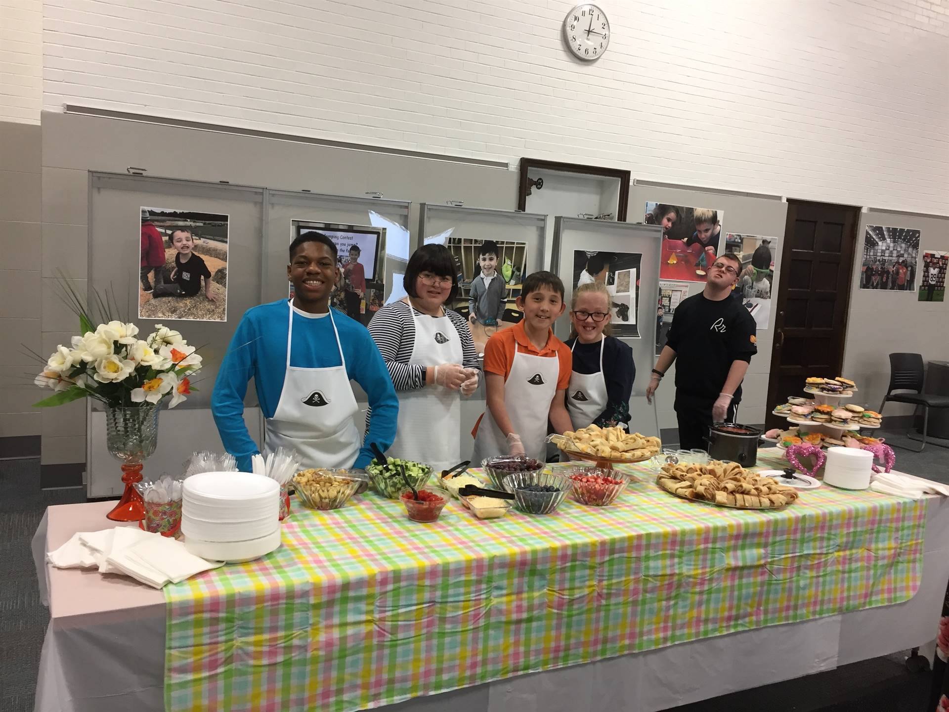 Middle School and High School Students Prepared, Presented and Served Food to Families!