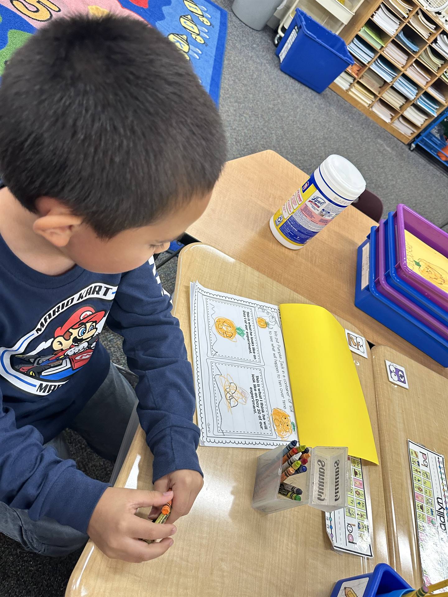 Recording our observations in our Pumpkin Jack Journal