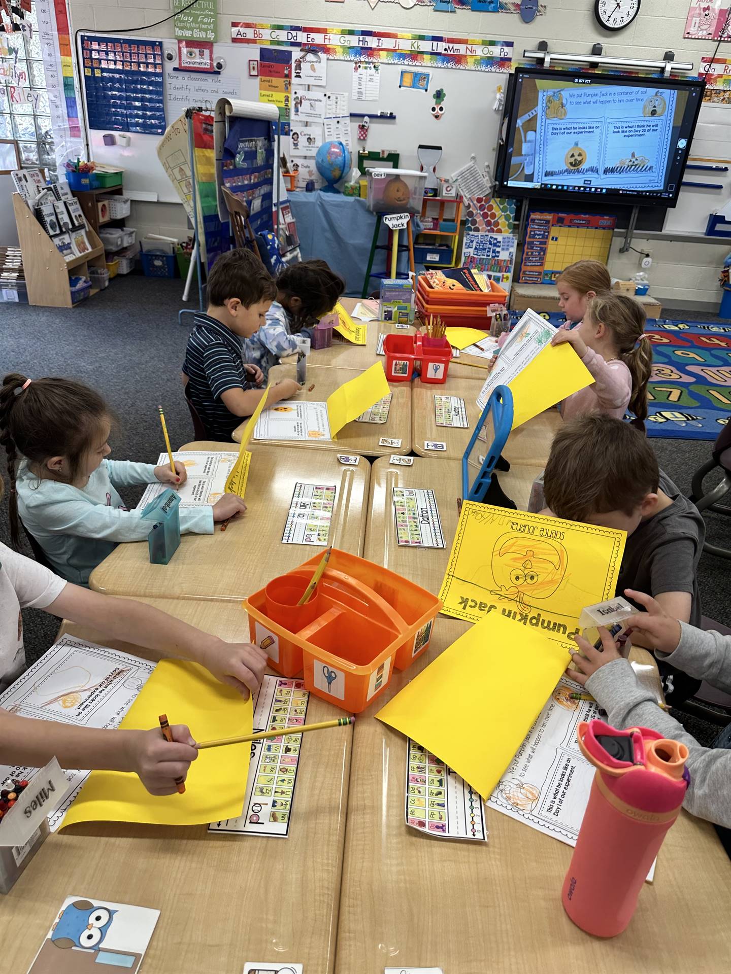 Recording our observations in our Pumpkin Jack Journal