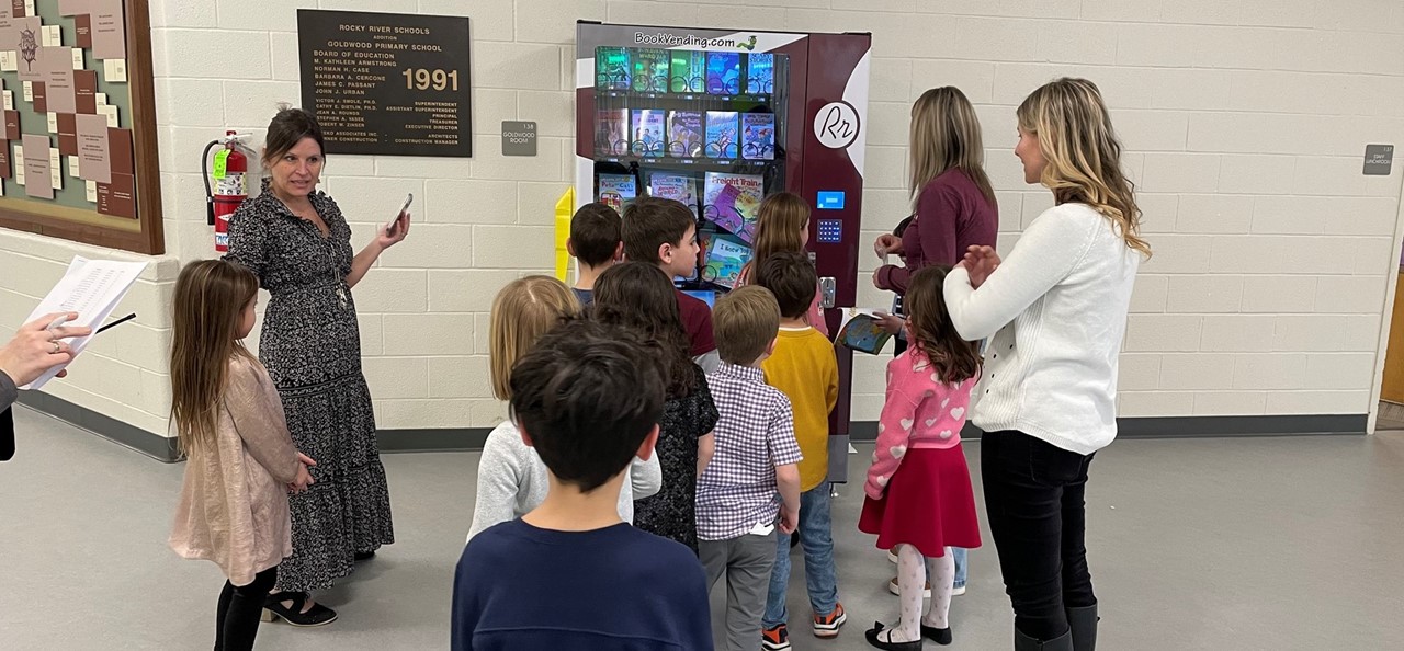 Students pick out their prizes at the new vending machine courtesy of a grant from the RREF